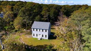 Photo of real estate for sale located at 1507 MA-6A Dennis Village, MA 02641